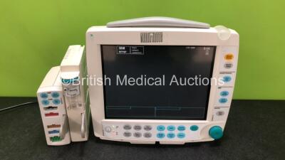 GE F-FM-0 Patient Monitor with 1 x GE Type N-FC-00 with Mini D-fend Water Trap, 1 x GE E-PSMP-00 Module Including ECG, Sp02, NIBP, P1, P2, T1 and T2 Options (Powers Up with Damage to Casing - See Photos) *SN 5217918 / 5222503 / 6689470*