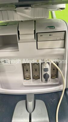 GE Logiq E9 Flat Screen Ultrasound Scanner Ref 5205000-7 *S/N 126048US8* **Mfd 03/2014** Software Version R4 Software Revision 3.0 with 1 x Transducer / Probe (C1-5-D Ref 5261132 *Mfd 03/2014) (Powers Up - Missing Dials / Switches - See Pictures - Keyboar - 12