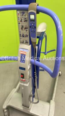 2 x Arjohuntleigh Maxi Move Patient Hoists with Batteries and Controllers (Both Power Up) and 1 x Arjo Sara Plus Hoist with Controller (No Battery) - 4