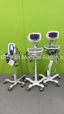 2 x Welch Allyn 53N00 Monitors on Stands with Power Supplies and 1 x Welch Allyn Spot Vital Signs Monitor on Stand - Broken off Stand (All Power Up)