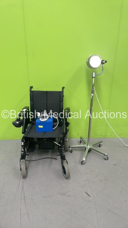 1 x Invacare Cruiser 4 E Electric Wheelchair with Charger (No Power - Missing Control Ball - See Pictures) and 1 x Brandon Medical Patient Examination Lamp (Powers Up with Good Bulb)