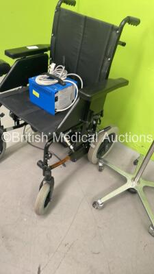 1 x Invacare Cruiser 4 E Electric Wheelchair with Charger (No Power - Missing Control Ball - See Pictures) and 1 x Brandon Medical Patient Examination Lamp (Powers Up with Good Bulb) - 6