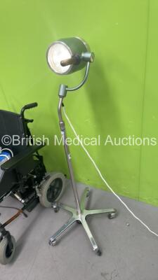 1 x Invacare Cruiser 4 E Electric Wheelchair with Charger (No Power - Missing Control Ball - See Pictures) and 1 x Brandon Medical Patient Examination Lamp (Powers Up with Good Bulb) - 9