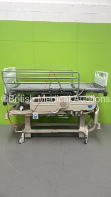 1 x Huntleigh Enterprise 5000 Electric Hospital Bed with Controller (Powers Up) and 1 x Hill-Rom Electric Hospital Bed (Not Power Tested Due to No Controller)