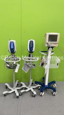 2 x Welch Allyn SPOT Vital Signs Monitors on Stands and 1 x Fukuda Denshi DS-7100 Patient Monitor on Stand ( All Power Up)