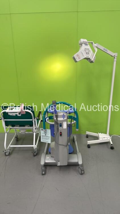 1 x Marsden Wheelchair Weighing Scales, 1 x Luxo Patient Examination Lamp on Stand (Powers Up) and 1 x Arjo Encore Electric Patient Hoist with Controller (Not Power Tested Due to No Battery) *S/N 031283*