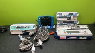 Mixed Lot Including 1 x Carefusion Alaris PK Pump (Powers Up with Damaged Syringe Driver-See Photo) 1 x GE Carescape V100 Patient Monitor with 1 x AC Power Supply, 1 x NIBP Hose and 1 x SpO2 Finger Sensor (Powers Up) 2 x Carefusion Alaris Plus GH Pumps (B