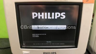 2 x Philips IntelliVue MP5 Patient Monitors Including ECG, NBP and SpO2 Options (Both Power Up, 1 x Damaged Casing - See Photos) *SN DE74808070 / DE74808055* - 3
