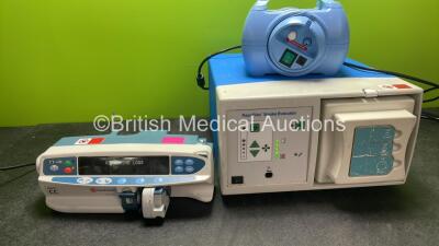 Mixed Lot Including 1 x Carefusion Alaris CC Pump (Powers Up with Fault-See Photo) 1 x Rapidvac Smoke Evacuator Unit with Filter (Powers Up) 1 x Econoneb Nebulizer (Powers Up with Damage-See Photo) *SN VL000932, M2010511078, 800353104*