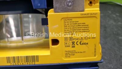 4 x LSU Laerdal Suction Units (All Power Up, 2 x with Damage to Casing) with 4 x Cups (3 x with Missing Lids) and 3 x Batteries *SN 78440965779 / 78231580046 / 78342091934 / 784514740528* - 10