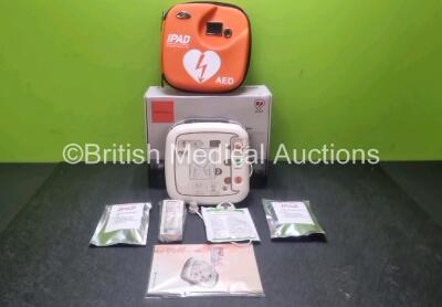 CU Medical Systems CU-SP1 Defibrillator with 2 x Electrode Packs *Mfd 2015* (Powers Up In Good Cosmetic Condition) and 2 x AED Starter Kits *SN G1N0Q0325*