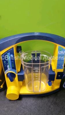 4 x Laerdal LSU Suction Units with 4 x Cups *All with Missing Lids and 4 x Batteries (All Power Up) *SN 78102150097 / 78101354919 / 78271469705 / 78271469779* - 2