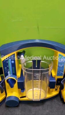 4 x Laerdal LSU Suction Units with 4 x Cups *All with Missing Lids and 4 x Batteries (All Power Up) *SN 78102150097 / 78101354919 / 78271469705 / 78271469779* - 4