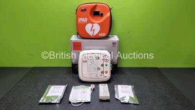 CU Medical Systems CU-SP1 Defibrillator with 2 x Electrode Packs *Mfd 2015* (Powers Up In Good Cosmetic Condition) and 2 x AED Starter Kits *SN G1N3Q0426**