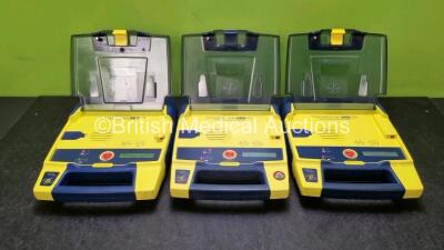 3 x Cardiac Science Powerheart AED G3 Automated External Defibrillators (All Power Up with Sock Battery Stock Battery Not Included 1 x Service Required) *SN 4360685 / 368411 / 4008910*