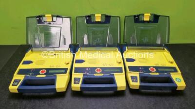 3 x Cardiac Science Powerheart AED G3 Automated External Defibrillators (All Power Up with Sock Battery Stock Battery Not Included) *SN 4161414 / 4326996 / 4157553*