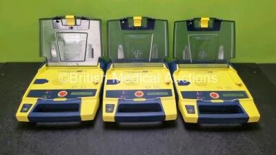 3 x Cardiac Science Powerheart AED G3 Automated External Defibrillators (All Power Up with Sock Battery Stock Battery Not Included) *SN 4157603 / 4275675 / 4326852*