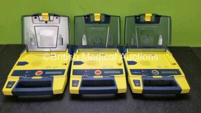 3 x Cardiac Science Powerheart AED G3 Automated External Defibrillators (All Power Up with Sock Battery Stock Battery Not Included) *SN 4008938 / 4161317 / 4018432*