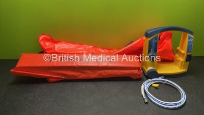 Mixed Lot Including 1 x Laerdal LSU Suction Unit with 1 x Battery (Powers Up with Missing Cup and Cracked Casing-See Photo) 1 x Ferno Frac Immobiliser Split and 1 x Hartwell Medical Fasplint *SN 78251357857*