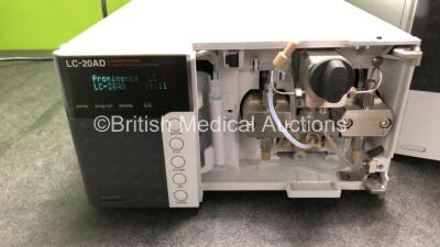 Job Lot Including 1 x Shimadzu SIL-20A Autosampler, 1 x Shimadzu LC-20AD Liquid Chromatograph, 1 x Shimadzu RF-20A Fluorescence Detector and 1 x Shimadzu DGU-20A3 Degasser (All Power Up with Missing Front Casing - See Photos) - 2