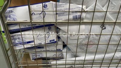 Large Quantity of Consumables Including Face Masks, Isolation Gowns, Coveralls and Overshoes - 2