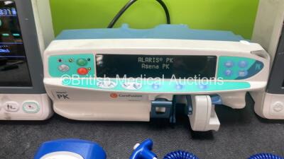 Mixed Lot Including 2 x Mindray VS-600 Patient Monitors (1 Powers Up, 1 No Power with Damage-See Photo) 1 x Alaris PK Pump (Powers Up) 2 x Covidien Filac ADA Thermometer (Both Untested Due to Possible Flat Batteries) 1 x Respironic REF 1112266 Nebulizer ( - 3