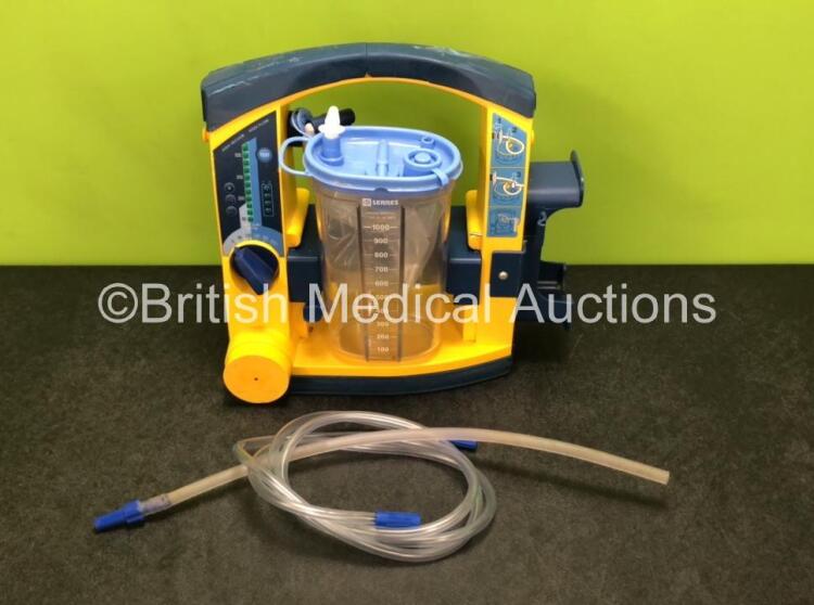 LSU Laerdal Suction Unit with Cup, Hoses and 1 x Battery (Powers Up with Cracks in Casing - See Photos)