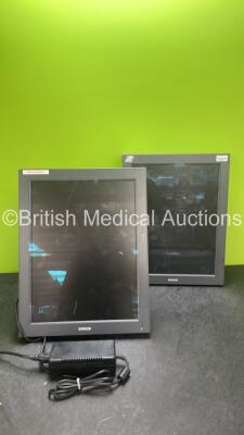 2 x Barco Monitors with 1 x AC Power Supply (Both Power Up, 1 with Cracked Screen-See Photo) *SN 1890100760, 1890102639*