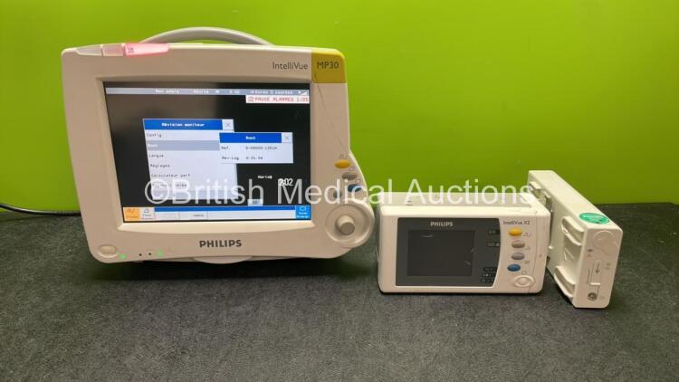 Philips IntelliVue MP30 Patient Monitor with 1 x Philips IntelliVue X2 Handheld Patient Monitor Including ECG, SpO2 and NIBP Options with 1 x Philips M4607A Battery, 1 x Philips M3015A REF 862393 CO2 Microstream Gas Module (Powers Up, Display Language in