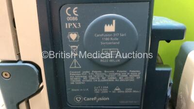 Job Lot Including 3 x CME McKinley Bodyguard 545 Epidural Infusion Pumps (All Power Up, 1 x Damaged Casing and Error 23 - See Photos) 1 x Cardinal Health Alaris GP Infusion Pump, 1 x CareFusion Alaris Plus GH Syringe Pump and 1 x CareFusion IVAC PCAM Syri - 6