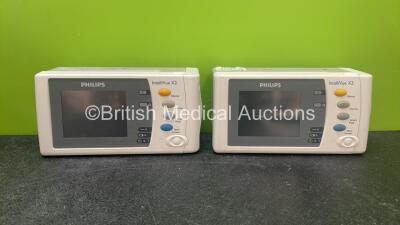 2 x Philips IntelliVue X2 Handheld Patient Monitors Including ECG, SpO2, NBP, Press and Temp Options with 2 x Philips M4607A Batteries (Both Power Up when Tested with Stock Batteries-Batteries Included Flat)