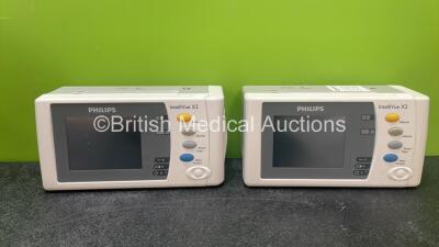 2 x Philips IntelliVue X2 Handheld Patient Monitors Including ECG, SpO2, NBP, Press and Temp Options with 2 x Philips M4607A Batteries (Both Power Up when Tested with Stock Batteries-Batteries Included Flat)