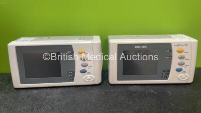 2 x Philips IntelliVue X2 Handheld Patient Monitors Including ECG, SpO2, NBP, Press and Temp Options with 2 x Philips M4607A Batteries (Both Power Up when Tested with Stock Batteries-Batteries Included Flat)