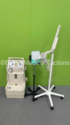 1 x Luxo Patient Examination Lamp on Stand (No Power). 1 x Accoson Greenlight Blood Pressure Meter with BP Hose and Cuff and 1 x OxyLitre Suction Pump (Powers Up) *S/N 12017002*