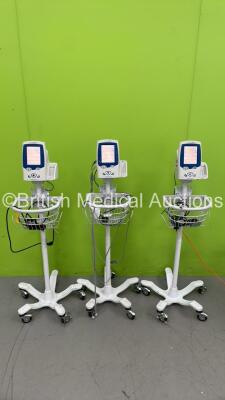 3 x Welch Allyn SPOT VItal Signs LXi Monitors on Stands (All Power Up - All Screen Covers Loose)