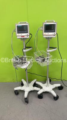 2 x Philips M3046A M3 Patient Monitors on Stands with 2 x Philips M3001A Multiparameter Modules and Selection of Leads (Both Power Up) *S/N DE00854349 / DE00850243*