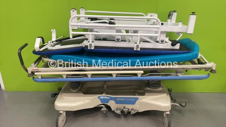 1 x Hill-Rom Transtar Hydraulic Patient Trolley with Mattress (Hydraulics Tested Working) and 1 x Bristol Maid Hydraulic Patient Couch (Missing / Damaged Wheel) *S/N NA*