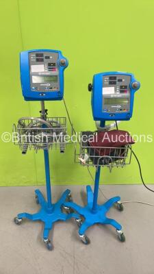 2 x GE Dinamap Pro 300V2 Vital Signs Monitors on Stands (Both Power Up)