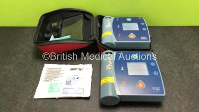 2 x Philips Heartstart FR2+ Defibrillators with 1 x Skintact Electrode Pads *Expires 08/2023* and 2 x Batteries in 1 x Carry Case (Both Power Up) *SN 0411891854 / 0511890673*