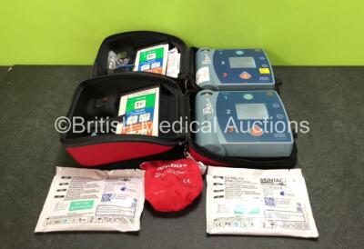 2 x Philips Heartstart FR2+ Defibrillators with 2 x Skintact Electrode Pads *Both Expire 2025* and 2 x Batteries in Carry Cases (Both Power Up) *SN 1111890670 / 1108293843*