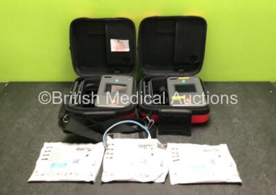 2 x Philips Heartstart FR3 Defibrillators with 3 x Electrode Packs *All in Date* in Carry Cases (Both Power Up with Stock Battery, Batteries Not Included) *SN C18B-00011 / C18D-00815*