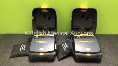 2 x Physio Control Lifepak CR Plus Defibrillators *Mfd 2016 / 2016* with 2 x Electrode Pads *Both in Date* and 2 x Res-Cue Masks in 2 x Carry Cases (Both Power Up)