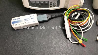 2 x Philips Heartstart MRx Defibrillators Including ECG and Printer Options with 2 x M3725A Test Loads, 2 x Paddle Leads, 2 x ECG Leads, 2 x Batteries and 1 x M33539A Module (Both Power Up then Shut Down - See Photos) - 5