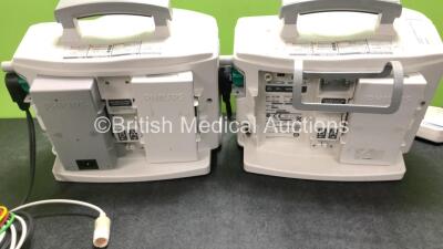 2 x Philips Heartstart MRx Defibrillators Including ECG and Printer Options with 2 x M3725A Test Loads, 2 x Paddle Leads, 2 x ECG Leads, 2 x Batteries and 1 x M33539A Module (Both Power Up then Shut Down - See Photos) - 7