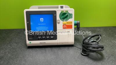 Philips Heartstart XL+ Defibrillator Including ECG and Printer Options with 1 x Paddle Lead and 1 x Battery (Powers Up) *SN US31410902*