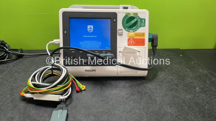 Philips Heartstart XL+ Defibrillator Including ECG and Printer Options with 1 x Paddle Lead, 1 x 3 Lead ECG Lead and 1 x Battery (Powers Up) *SN US31410944*