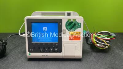 Philips Heartstart XL+ Defibrillator Including ECG and Printer Options with 1 x Paddle Lead, 1 x 3 Lead ECG Lead and 1 x Battery (Powers Up) *SN US31410958*