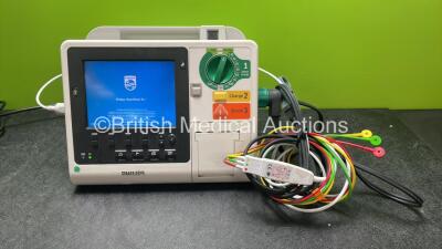 Philips Heartstart XL+ Defibrillator Including ECG and Printer Options with 1 x Paddle Lead, 1 x 3 Lead ECG Lead and 1 x Battery (Powers Up) *SN US31410900*