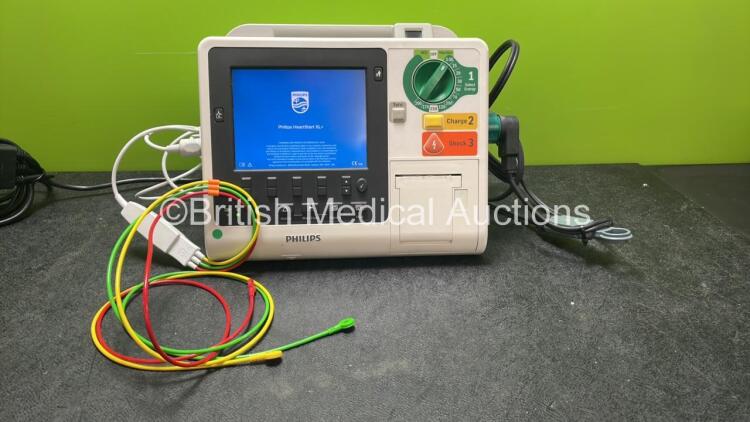 Philips Heartstart XL+ Defibrillator Including ECG and Printer Options with 1 x Paddle Lead, 1 x 3 Lead ECG Lead and 1 x Battery (Powers Up) *SN US31410931