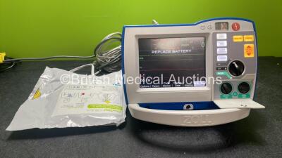 Zoll R Series Plus Defibrillator / Monitor Including Pacer, ECG and Printer Options with 1 x Zoll Sure Power II Battery, 1 x 3 Lead ECG Lead and 1 x Zoll Onestep Adult Electrode Pads *Exp 28-04-2024* (Powers Up)